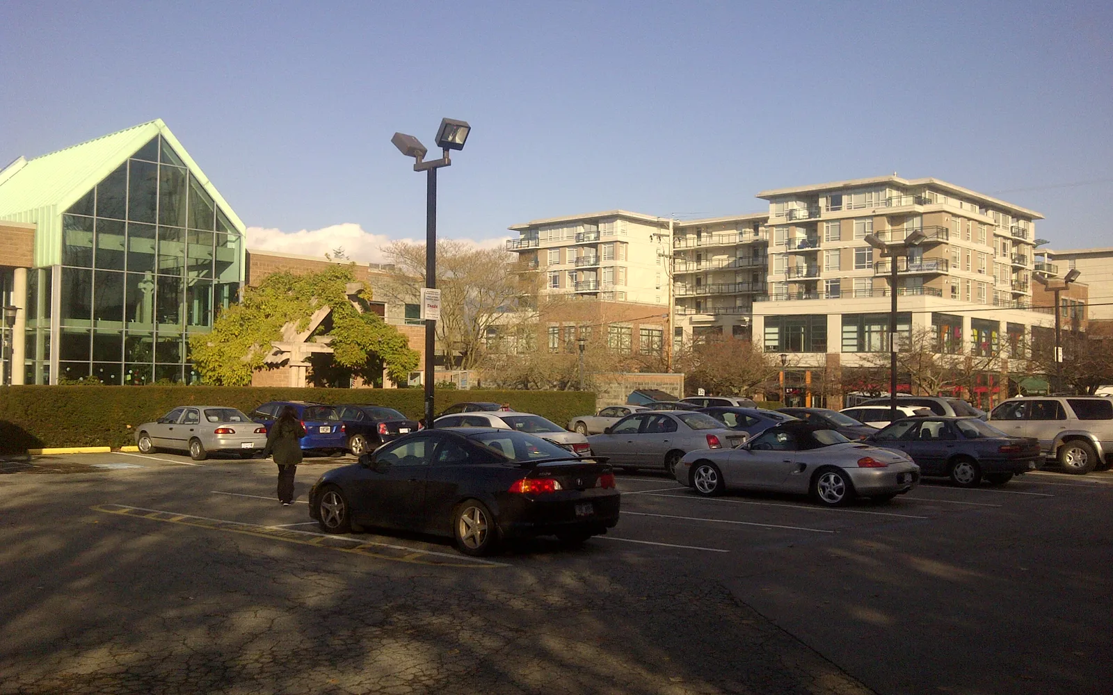 Parking lot and commercial development area showing urban infrastructure and growth